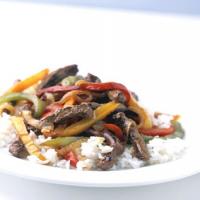 Mixed-Pepper Steak with Onions image