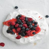 Pavlova with Raspberry Curd and Berries image