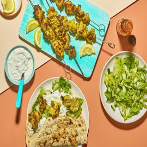 Spiced chicken kebabs with chopped salad & flatbreads image