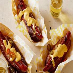Pretzel Buns with Grilled Dogs and Spicy Cheese Sauce_image