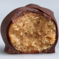 Dark Chocolate Peanut Butter Balls Recipe by Tasty image