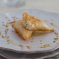 Phyllo Triangles Stuffed with Fresh Cheese (briouats bil jben) image