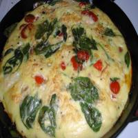 Frittata With Cherry Tomatoes and Baby Spinach image