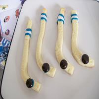 Hockey Sticks and Pucks Cookies image