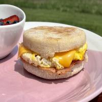 English Muffins With Eggs, Cheese and Ham image