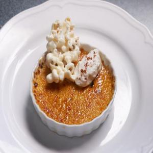 Butterscotch Crème Brûlée with Pink Peppercorn Whipped Cream and White Chocolate Sea Salt Popcorn image