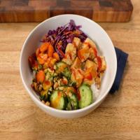 Vegan Tofu Bowls with Coconut Rice, Cucumber Salad and Peanut Sauce image