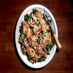 Rabbit Legs with Peas, Collards and Country Ham image
