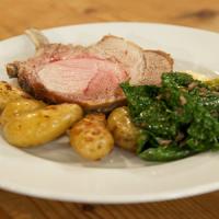 Berkshire Pork Chops with Pan-Fried Fingerling Potatoes and Wilted Kale_image
