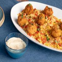 Cheesy Shrimp Scampi Beignets with Corn Maque Choux and Basil Remoulade_image