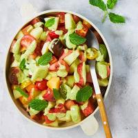 Salad of melon & tomatoes with mint & elderflower dressing image