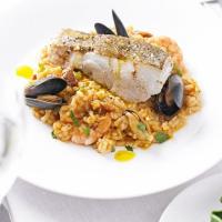 Roast cod with paella & saffron olive oil image