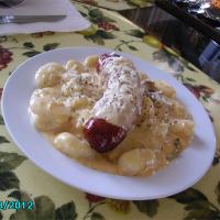 Bangers and Gnocchi with a Roasted Shallot and Cheese Sauce image