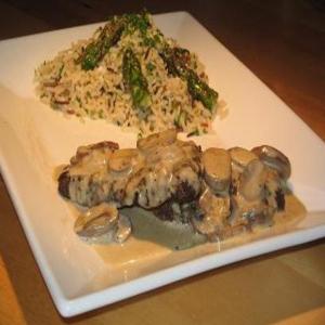 Ostrich Steaks With Mushroom Vanilla Sauce and Wild Rice With As_image
