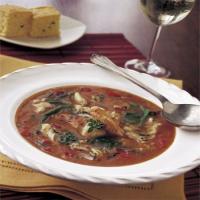 Spicy Cajun Crab and Greens Soup image