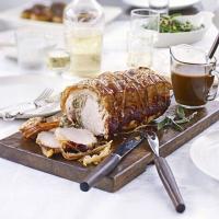 Roast loin of pork with sage & onion stuffing & gravy image