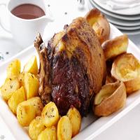 Roast beef with Yorkshire puddings, roast potatoes and gravy_image