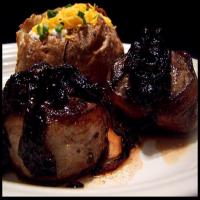 Bacon Wrapped Steak With Balsamic Onion Sauce_image