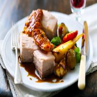 Roast belly of pork with root vegetables_image