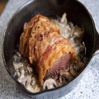 Bacon-Wrapped Venison Tenderloin with Garlic Cream Sauce image