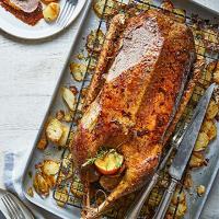 Honey-glazed spiced roast goose & confit potatoes_image