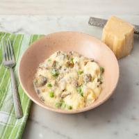 Ricotta Gnudi and Butter Sauce with English Peas and Mushrooms_image