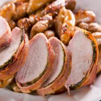 Bacon-Wrapped Pork Roast with Potatoes and Onions image