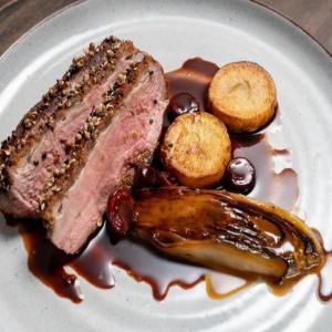 Duck Breast with Dukkah Crust, Endive, Potato and Sour Cherry Jus image