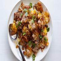 Crisp Smashed Potatoes With Fried Onions and Parsley image