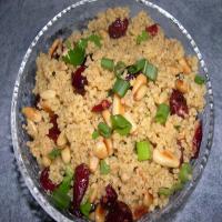 Couscous With Curry, Cranberries and Toasted Pine Nuts image