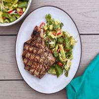 Grilled Pork Chops with Smashed Cucumbers and Green Curry Vinaigrette image