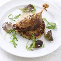 Confit of duck with herbed potato cakes image