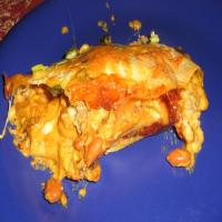 Saturday Night Chicken, Cheese and Refried Bean Enchiladas image