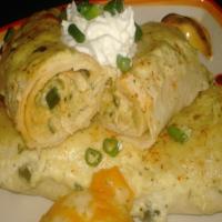 Roasted Poblano and Chicken Enchiladas With Sour Cream Sauce image