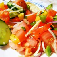Colorful Tomato Salad with Rose Water Dressing image