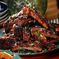 Asian Spice Rubbed Ribs with Pineapple-Ginger BBQ Sauce and Black and White Sesame Seeds image