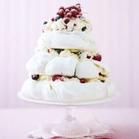 Pavlova cake with berries & cream image