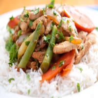 Chicken Stir-Fry with Peanut Sauce Over Rice image