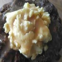Stuffing Meatloaf in bundt with potatoes and gravy_image