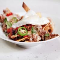 Black Bean and Beef Chilaquiles with Fried Eggs image