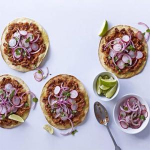 Spicy bean tostadas with pickled onions & radish salad image