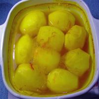 Potatoes Braised in Saffron Stock image