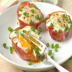 Baked Egg in Ham Cups With Parmesan and Green Onion image