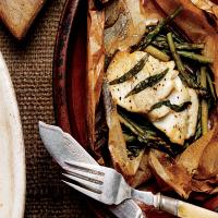 Fish Fillets in Parchment with Asparagus and Orange image