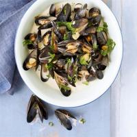 Steamed mussels with cider, spring onions & cream image