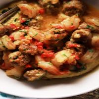 Sausage, Shrimp and Peppers over Cheesy Grits_image