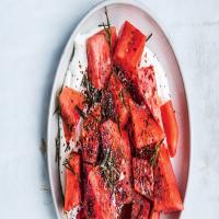 Watermelon With Yogurt, Poppy Seeds, and Fried Rosemary Recipe image