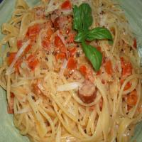 Penne With Sausage, Tomato, Red Pepper in Cream Sauce image