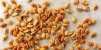 best-roasted-pumpkin-seeds-recipe-delish image