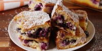 best-lemon-blueberry-cheesecake-bars-recipe-delish image